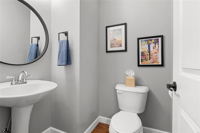 bathroom with sink and toilet