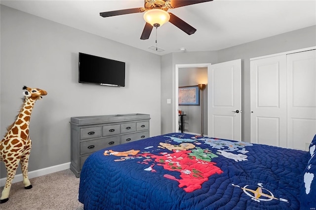 bedroom with light carpet, a closet, and ceiling fan