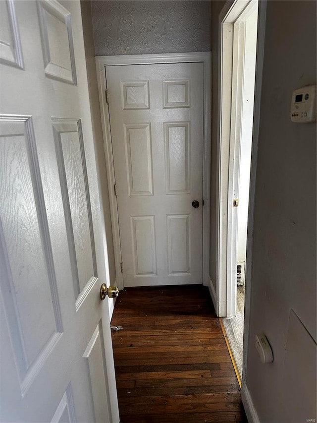 interior space with dark hardwood / wood-style flooring