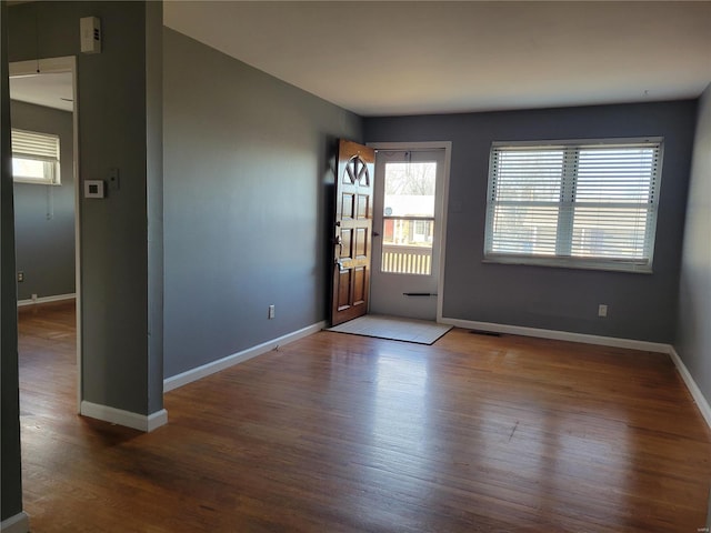 interior space with hardwood / wood-style floors