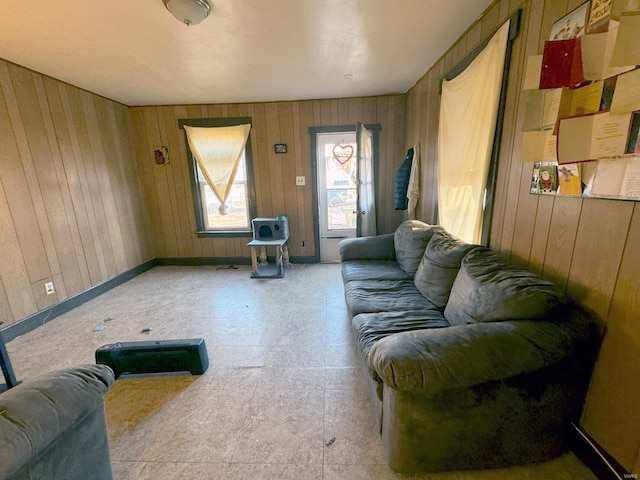 living room with wooden walls