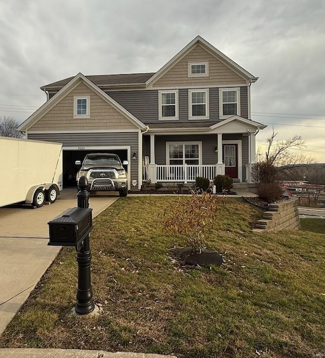 view of front of property with a porch and a front yard