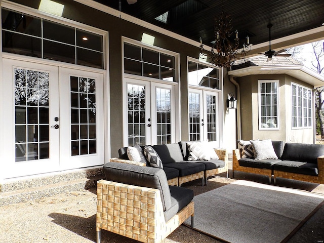 view of patio / terrace with french doors and an outdoor living space