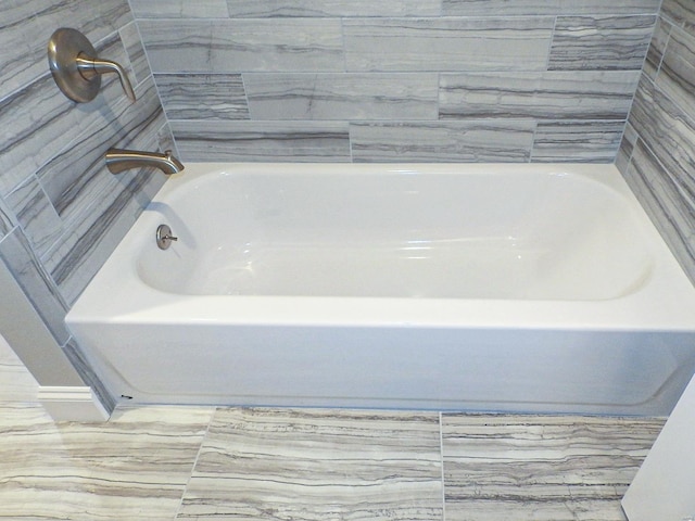 bathroom with a bathing tub