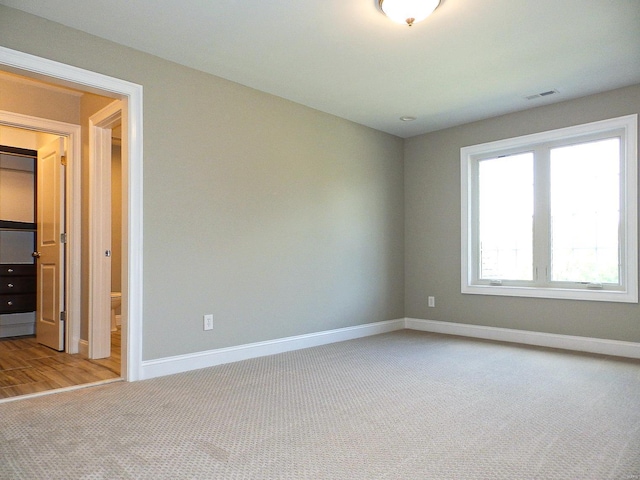 view of carpeted spare room