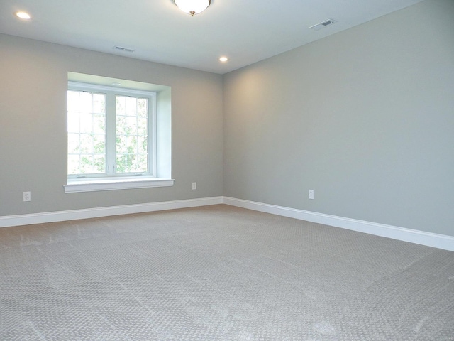 spare room with carpet flooring