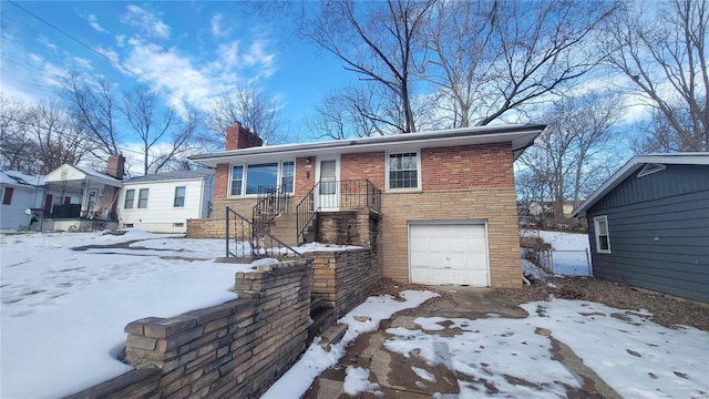 view of front of home with a garage