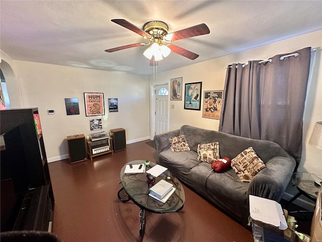 living room featuring ceiling fan