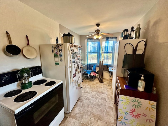 kitchen with ceiling fan, white refrigerator, and range with electric cooktop