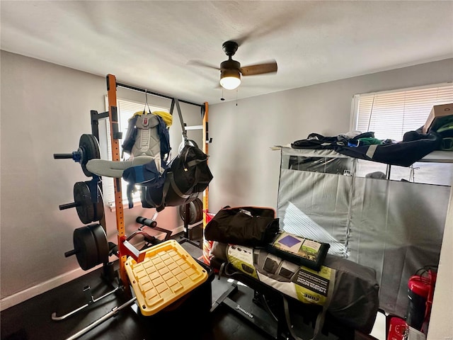 workout area featuring ceiling fan