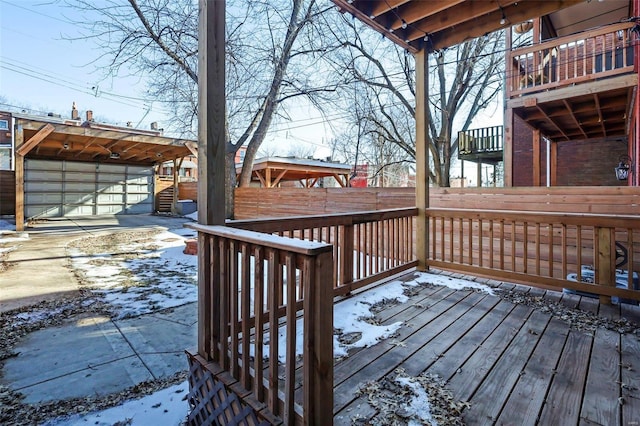 view of snow covered deck