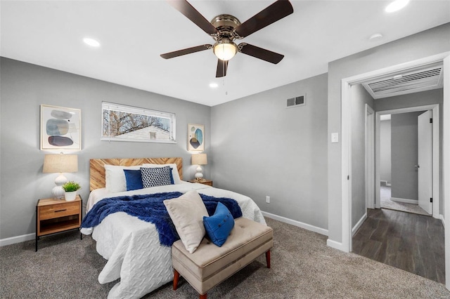 bedroom with dark colored carpet and ceiling fan