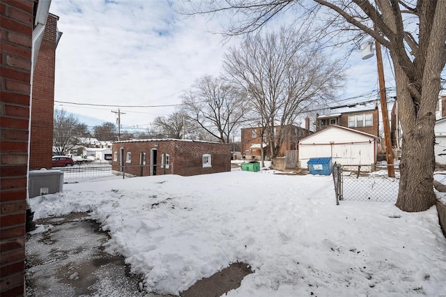 view of yard covered in snow