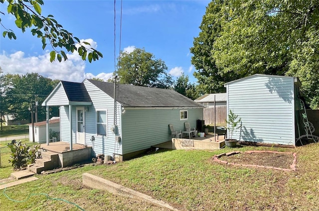 exterior space with a yard and a storage shed