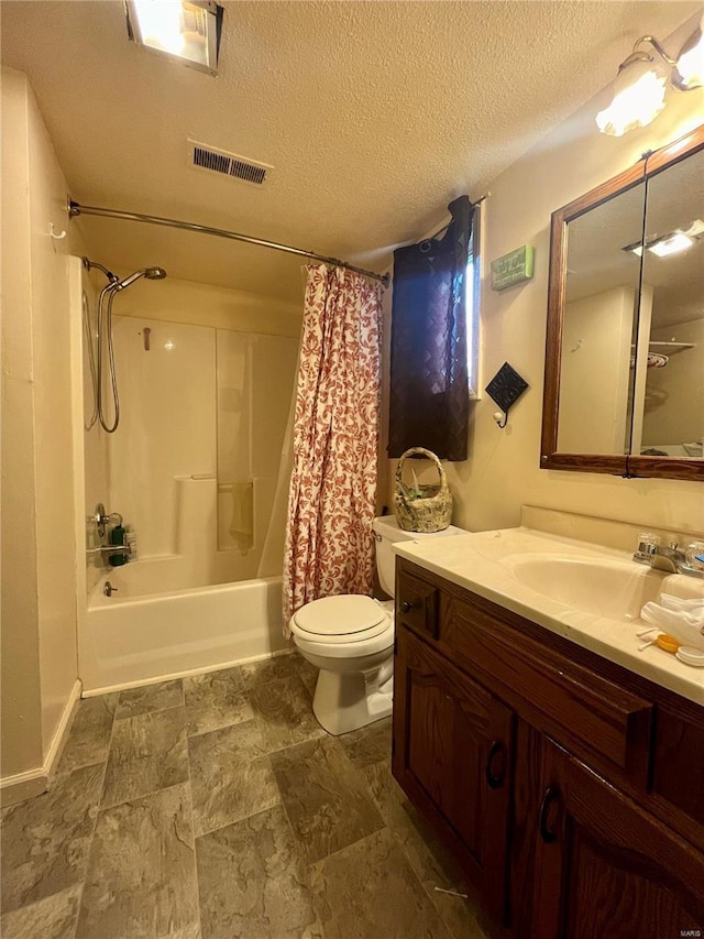 full bathroom featuring toilet, a textured ceiling, shower / tub combo with curtain, and vanity