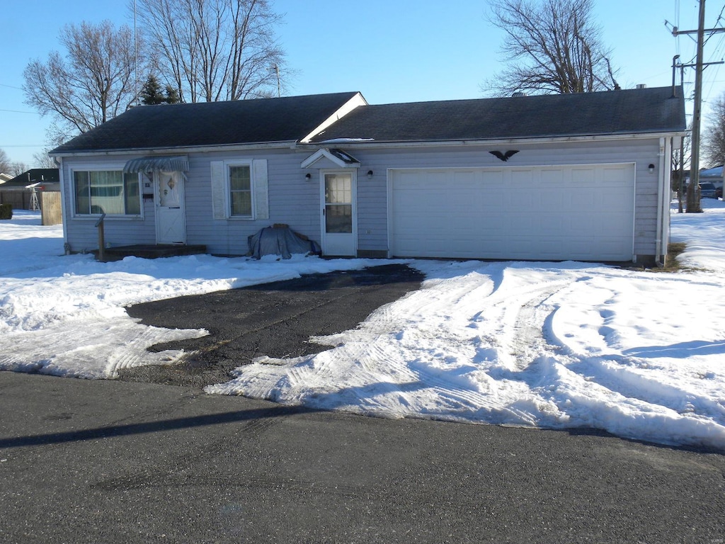 single story home with a garage