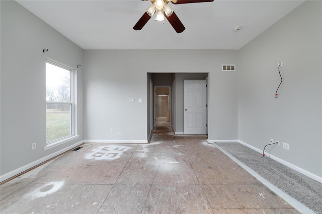 empty room featuring ceiling fan