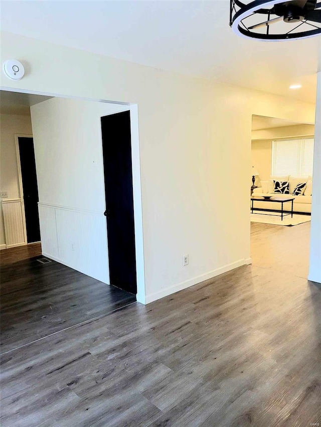 spare room featuring hardwood / wood-style floors