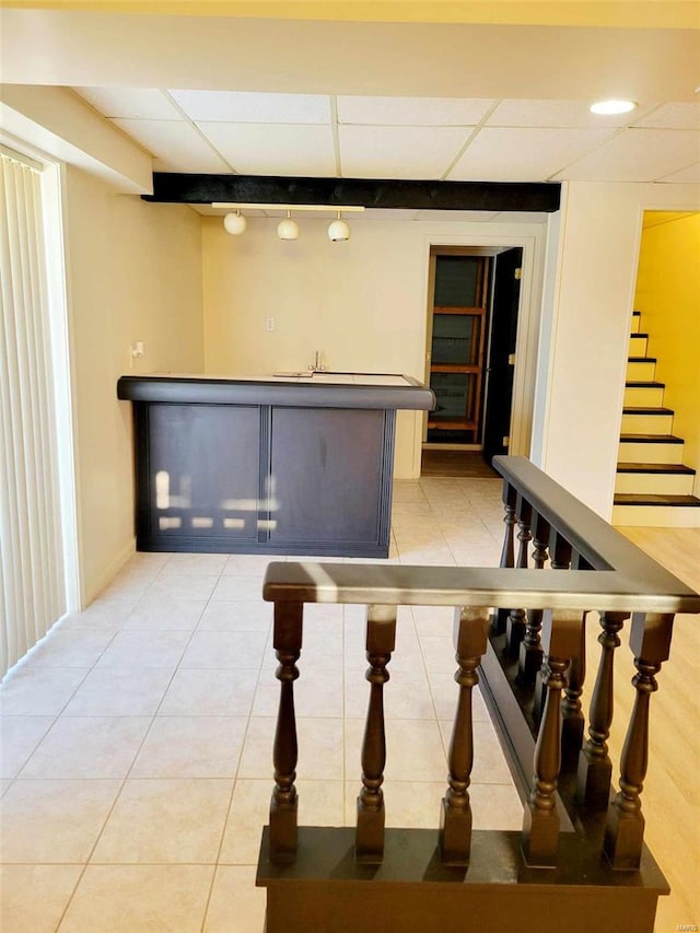 bar with light tile patterned floors