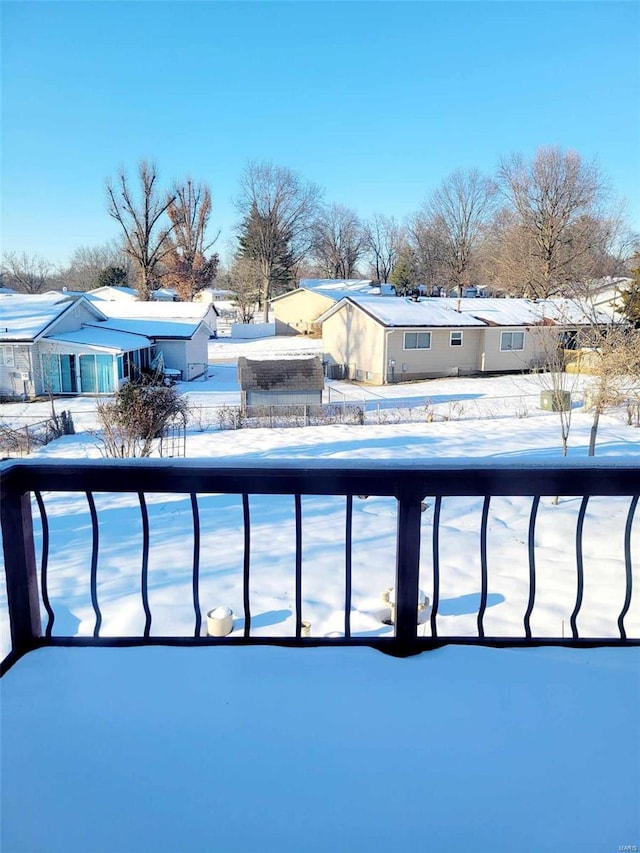 view of snow covered pool