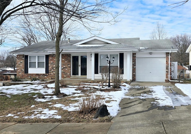 single story home featuring a garage