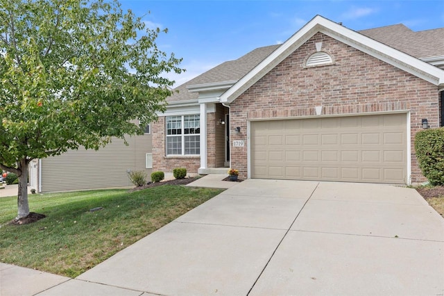 view of front facade featuring a garage and a front lawn