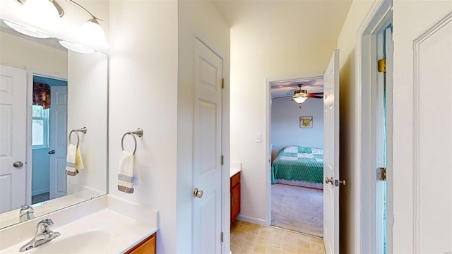 bathroom featuring vanity and ceiling fan