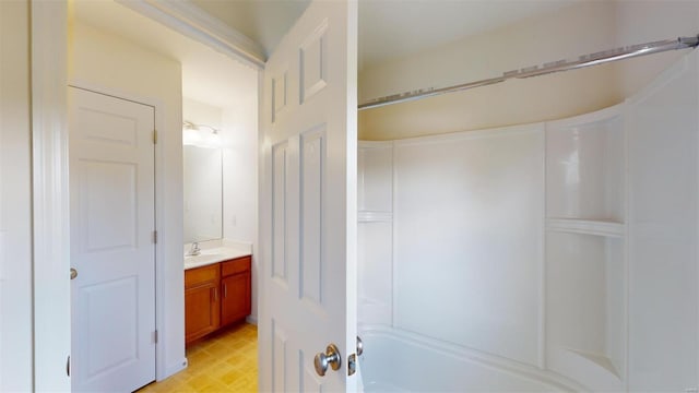 bathroom with tub / shower combination and vanity