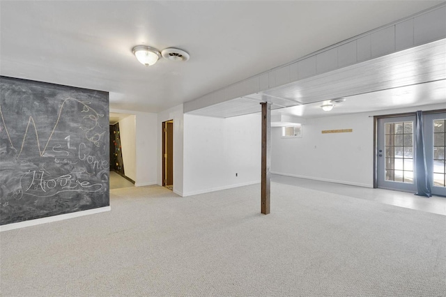 basement with light colored carpet