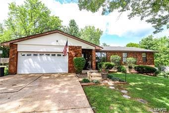 ranch-style house with a front lawn and a garage