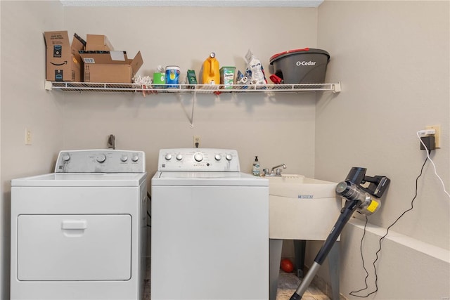 washroom featuring independent washer and dryer