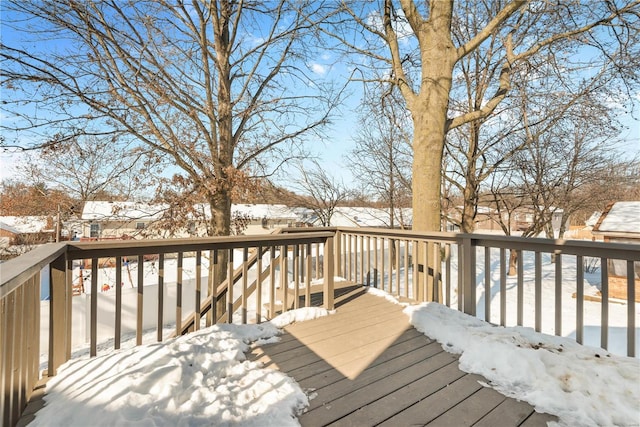 view of snow covered deck