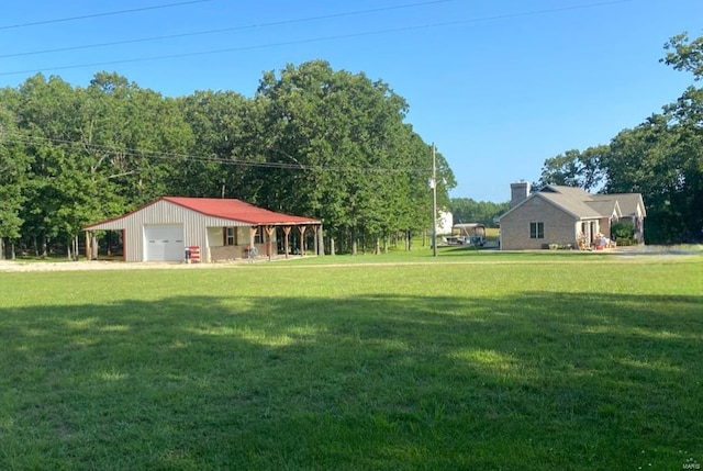 view of yard featuring a garage