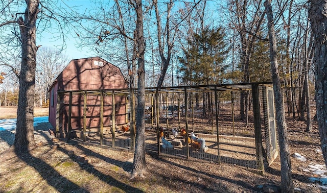 view of playground with an outbuilding