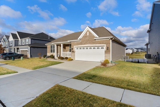 view of front of property featuring a front lawn, a residential view, concrete driveway, an attached garage, and brick siding