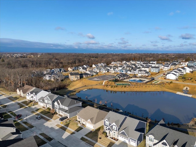 aerial view with a residential view and a water view