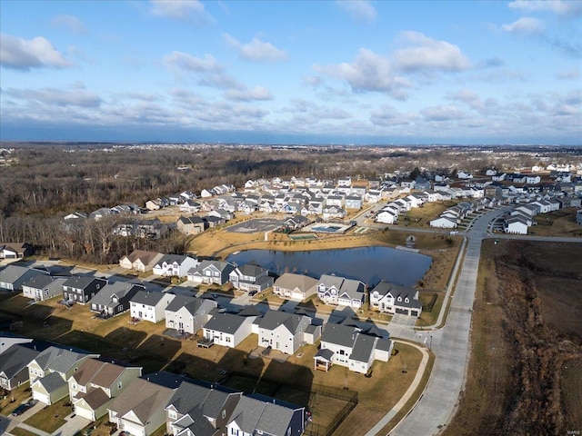 bird's eye view with a residential view and a water view