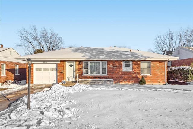 single story home with a garage