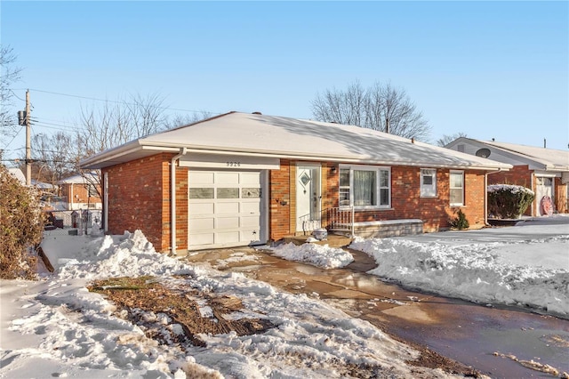 single story home featuring a garage