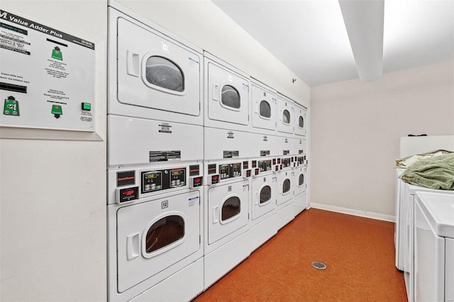 clothes washing area featuring stacked washer / dryer and washing machine and dryer