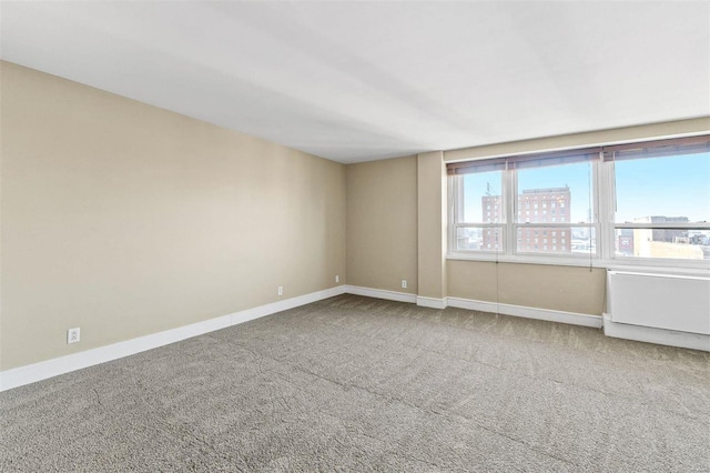 empty room with carpet flooring