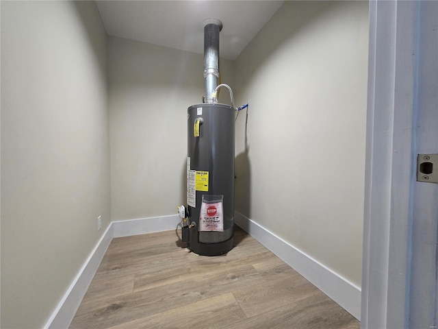 utility room with water heater