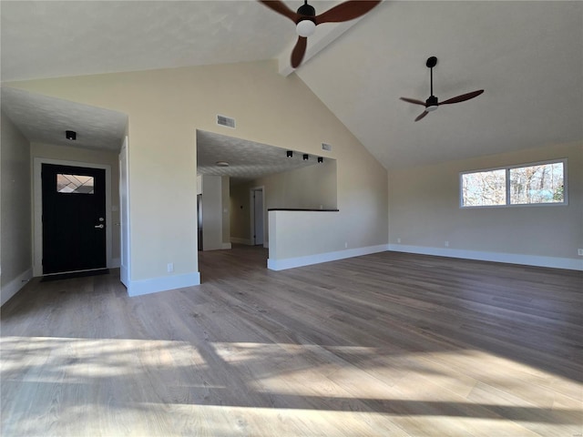 unfurnished living room with ceiling fan, baseboards, visible vents, and light wood-style floors