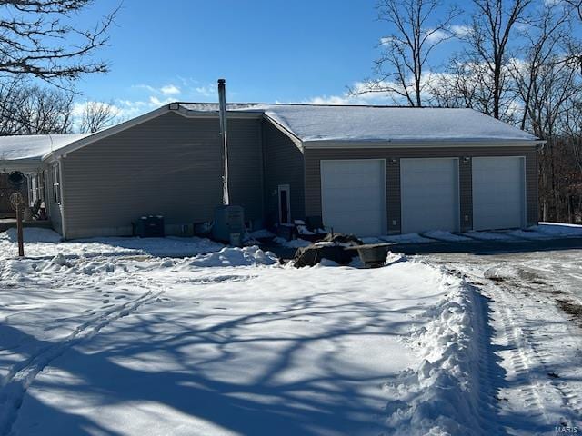 exterior space with a garage