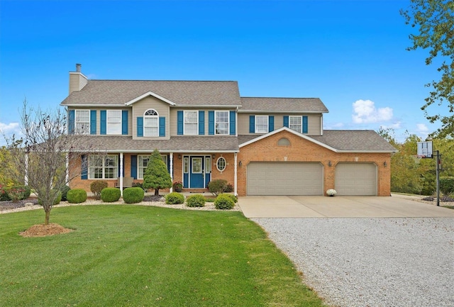 colonial inspired home featuring a front lawn