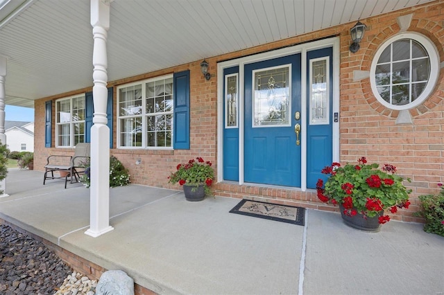 entrance to property with a porch