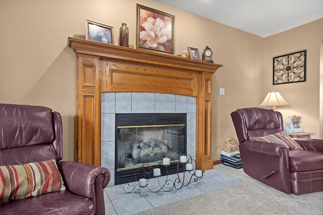 living area with light colored carpet and a fireplace