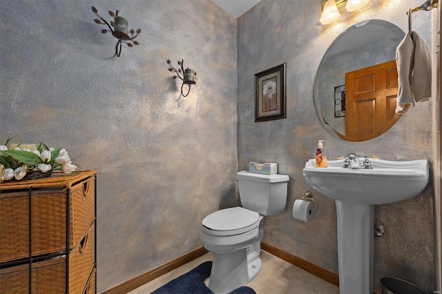 bathroom featuring toilet