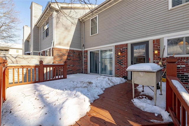 view of snow covered deck