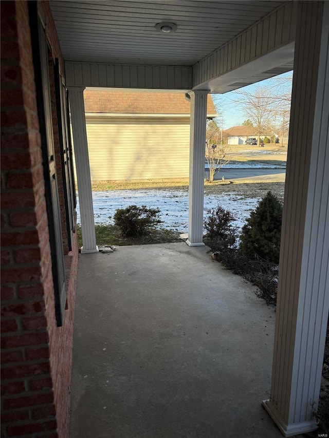 doorway featuring concrete flooring